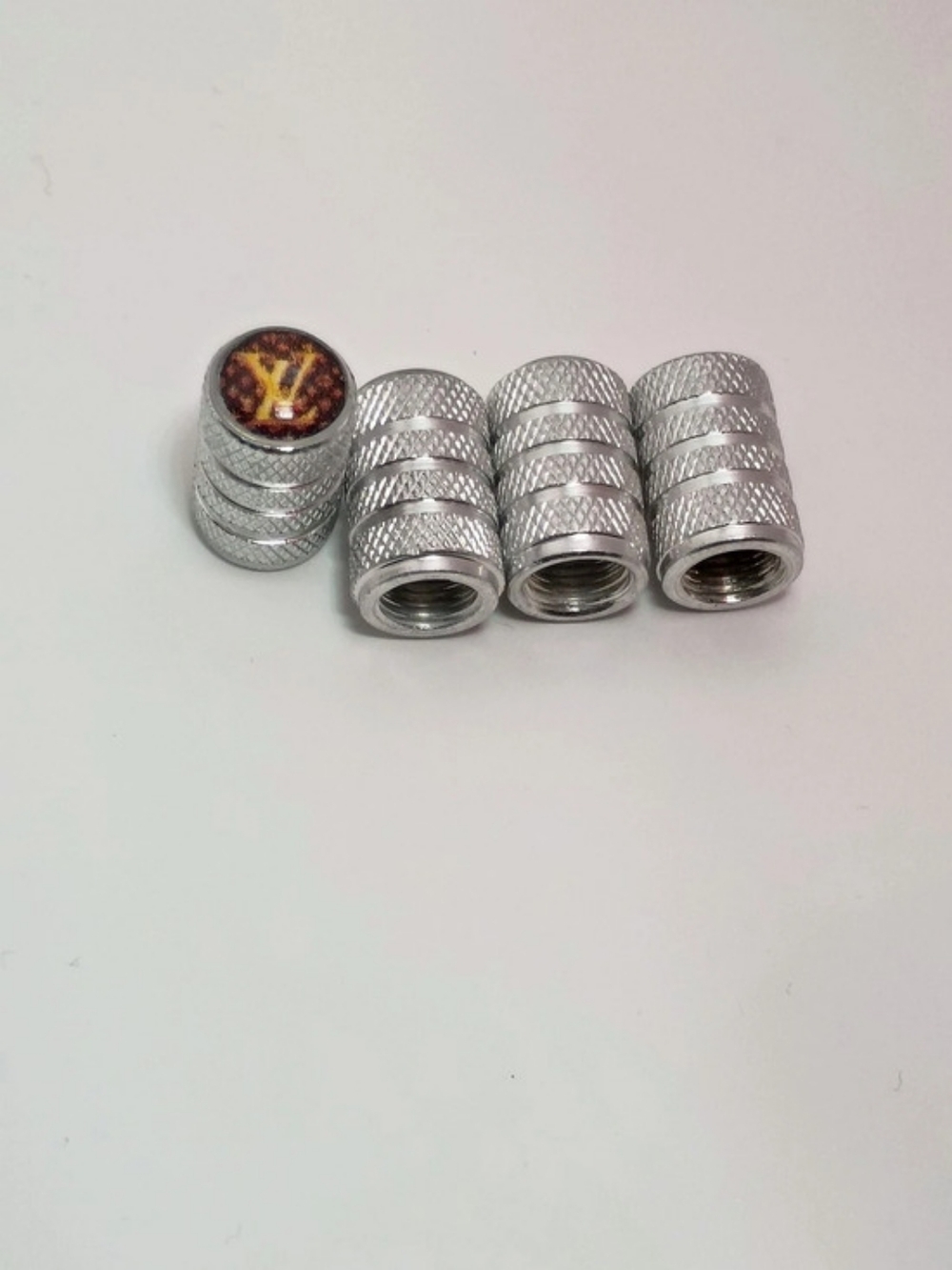 Louis Vuitton Silver Textured Metal Tire Valve Caps Set Of 4
